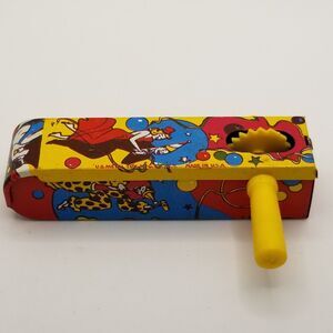 vintage tin lithograph ratchet style US Metal Toy Co noisemaker party theme